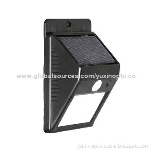 Light sensor LED solar yard lamp